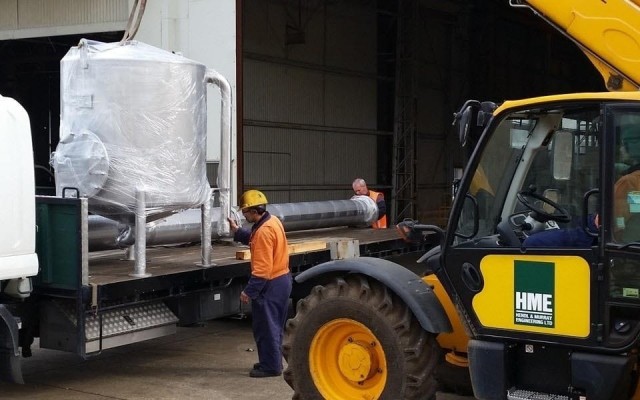 Loading 1,300 litre CIP tank for delivery
